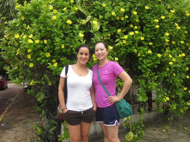 Beata and Thanh, standing pretty on the flower-lined streets of Playa