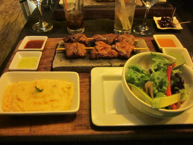 Beef Anticuchos, aka Peruvian kebabs...grilled on a volcanic stone with hot chili peanut mashed potatoes