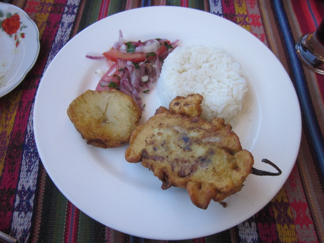 Rocoto de relleno, pepper stuffed with beef and cheese, battered and deep fried.  Interesting.