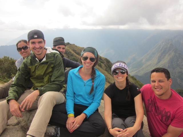 Taking a breather with our gang at the third summit.  We were literally above the clouds!
