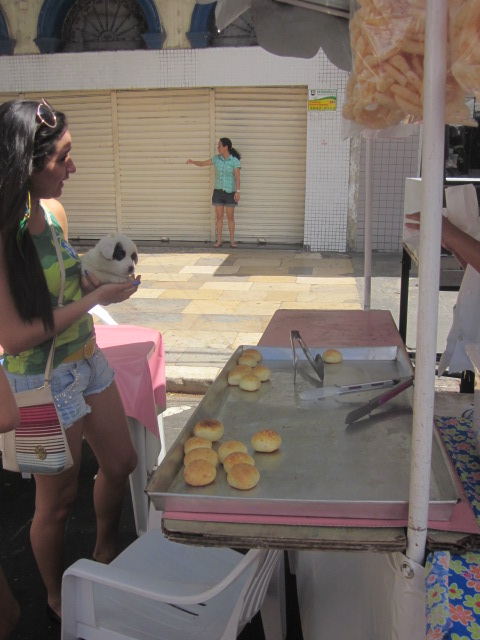 Fresh pao de queijo!  Also super cute puppy.