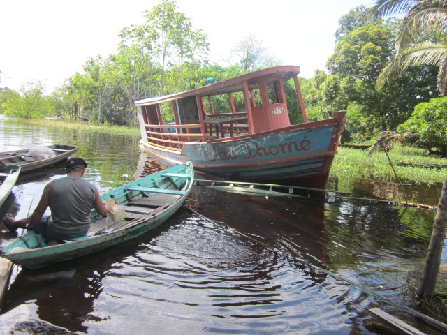 The "dock" by our lodge.  The boat you see here once served as the area's "school bus."