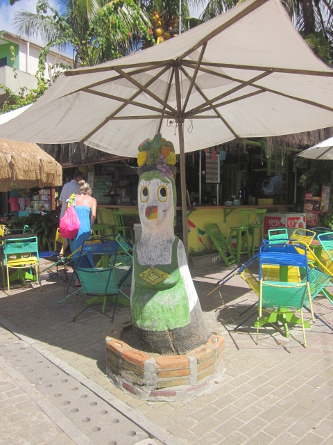 Funny wooden chickens in all sorts of "outfits" strewn all over Porto de Galinhas